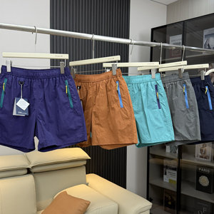 
Outdoor mountain style! Loose and versatile color contrast between men and women, light and breathable hiking sports and casual shorts beach pants