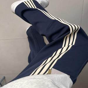 
Navy three-stripe straight-leg sweatpants for women in autumn and winter American trendy brand oversize high-end handsome sweatpants