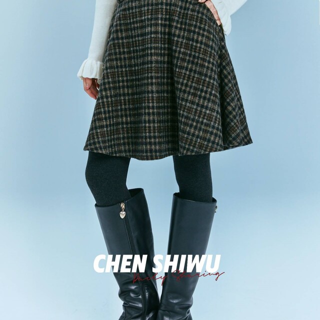 Chen Shiwu 24 autumn and winter retro plaid A-line mid-skirt niche design woolen small high waist umbrella