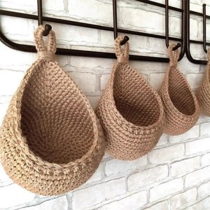 
Foreign trade wall-mounted braided hemp rope vegetable fruit basket kitchen wall-mounted ginger garlic storage basket storage bag