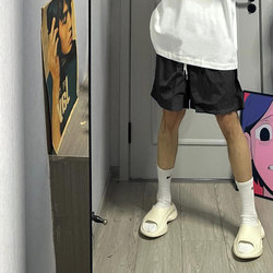 Summer American fashion brand sports black shorts for boys loose solid color beach casual quick-drying five-point paratrooper pants