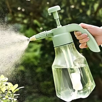 Hand-pressed spray bottle for watering flowers, gardening and green plants