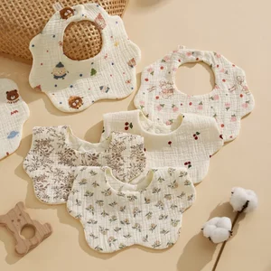 
Babies' six-layer gauze bibs. Newborn saliva bibs. Children's scarves. Baby scarves. Petal bibs.