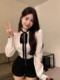 French stand-up collar white long-sleeved shirt for women in autumn and winter waist-hugging unique slim fit and slim shirt design niche top
