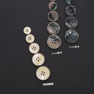 
Manufacturer spot metal base resin double-piece four-eye button men and women knitted sweaters woolen coat windbreaker eye button