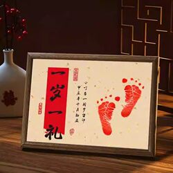 Baby with hand and foot prints, one month old and one hundred days old