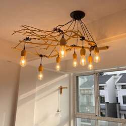 Internet celebrity LED branch chandelier living room restaurant tea room bed and breakfast clothing store goddess scattered flowers multi-head Nordic wood art lamp