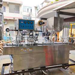 Guangzhou automatic plastic cup filling and sealing machine juice jelly filling and sealing machine Guiling paste filling and sealing machine