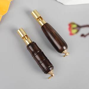 
Brass purple sandalwood outdoor lifesaving whistle keychain pendant competition treble whistle mountaineering training pendant