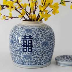 Blue and white porcelain round jar with the word 
