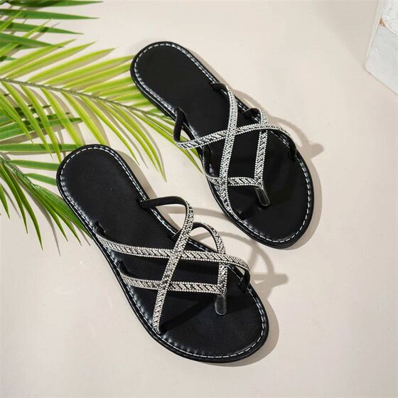 Elegant strappy sandals with black rhinestone design, flat-s