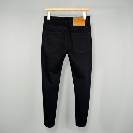 
Pure black anti-fading nine-point jeans for men, four-sided light luxury Laiser versatile trendy slim-fit pants