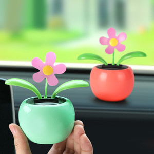 Net Red Car Internal Swing Motor Creative Clear solar energy shaking the head car car on the car decoration of the sun flower girl
