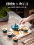 Bộ Ấm Trà Xiaoyao Sáng Tạo Xoay Tự Động Khẩn Cấp Tay Cầm Bên Nồi Hộ Gia Đình Bộ Trà Gốm Sứ Lười Pha Trà Hiện Vật ấm trà sứ 