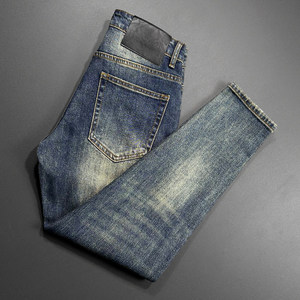
Nine-point jeans men's Korean style retro style blue stretch slim trendy cat whisker fake ripped handsome trousers