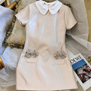 
2025 new style of Qianjin Style Nail Bead Bow Pink Doll Collar Short Sleeve Dress for Women Heavy Industry Slim A-line Skirt