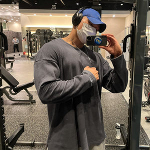 Spring and autumn American solid color striped sports sweater men's long -sleeved T -shirt large size loose and shoulder fitness training round neck