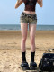 American style Y2K retro hot girl low -waist denim shorts female summer new slimming thin A -line hip hot pants tide