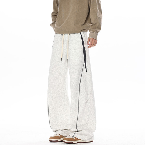 
Wukong has in stock trendy American drawstring elastic sports pants for men and women, retro loose, trendy and versatile wide-leg trousers.