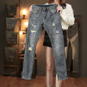
High-end original autumn and winter designer men's jeans blue hole patch personality trendy slim fit small feet elastic