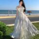 French ruffled beach short-sleeved dress new seaside vacation style high-end fairy flowing suspender skirt

