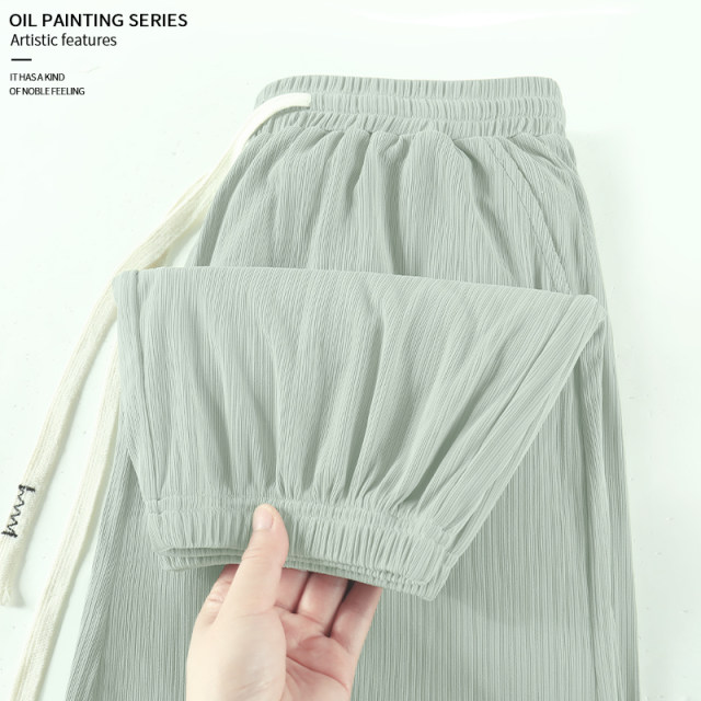 KV Zhenweis ice silk pants for women in summer 2025 new pleated casual pants gray-green high-end ice-sensing trousers