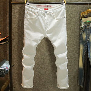 
High-end beige jeans for men, slim-fit stretch pants for small feet, trendy brand personalized embroidery, versatile casual pants