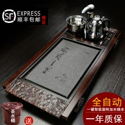 Khay trà đá vàng đen hoàn toàn tự động gia dụng bằng gỗ nguyên khối trà biển bàn trà kung fu bộ trà 4 trong 1 bếp cảm ứng
