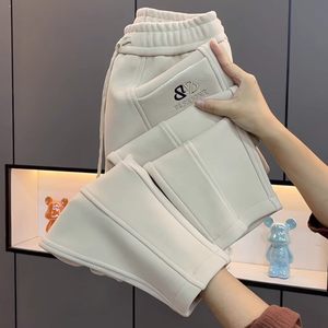 Autumn and winter new plus velvet thickened sports pants female fashion foreign foot Harn pants wild embroidered casual pants
