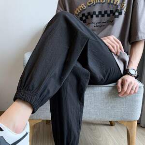Cotton pants men's summer thin nine -point casual pants boys linen thin sports pants wild black beam pants