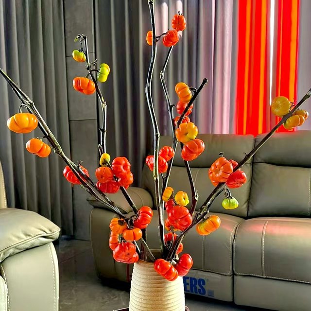 Fresh net red little pumpkin small tomato flower really flowers fresh cut branches and long flowers period can be used as dry flowers
