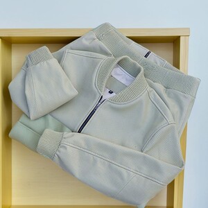 
Qingdao leather jacket spring and autumn new high-end welfare uniform for men and women neutral leather punching duck egg green sheepskin baseball suit