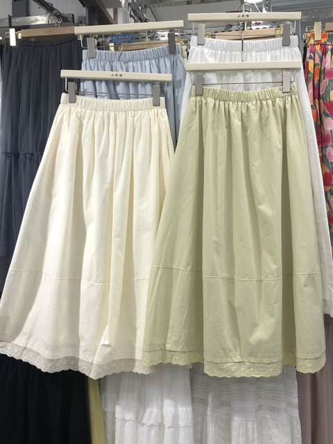 Solid color Korean lace skirt for women in spring and summer new high-waisted A-line skirt mid-length pocket temperament umbrella skirt
