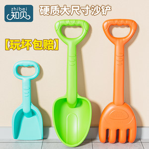 Children's beach toys sand shovel tool folding bucket baby playing with water at the seaside sand and soil rushing sea set