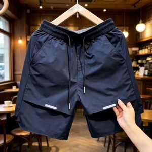 
Summer trendy brand laser punched splicing quick-drying shorts for men, simple, fashionable, versatile, breathable, casual five-quarter pants for couples