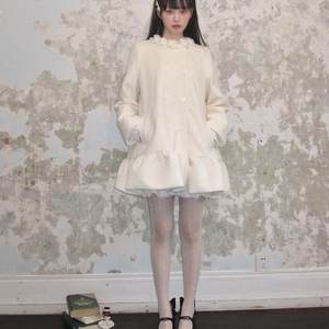 Nanxi Qianjin Advanced Flower Bud Coat Girl 2024 Winter New Middle Long Cloak Double Ranking Mao Woors Jacket
