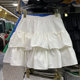 2025 new fluffy skirt short skirt solid color high-waisted skirt ruffled A-line skirt versatile to make you look slim and cover your flesh casually
