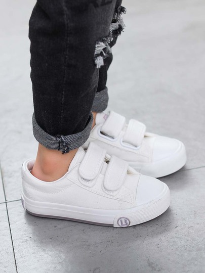 girls white canvas sneakers