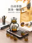 bàn uống trà điện Bộ trà tự động bằng thủy tinh, ấm trà từ tính gia dụng mới, hiện vật pha trà kung fu lười, nhẹ sang trọng và cao cấp hướng dẫn sử dụng bàn trà điện