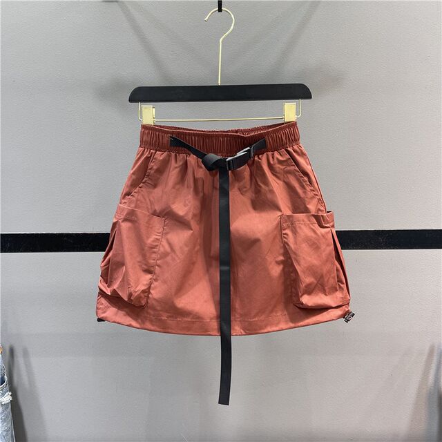 Large pocket worker skirt female 2024 summer new loose waist tape rope thinner A -line casual sports skirt
