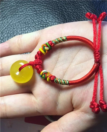 晶世缘红绳手工编织的LOGO