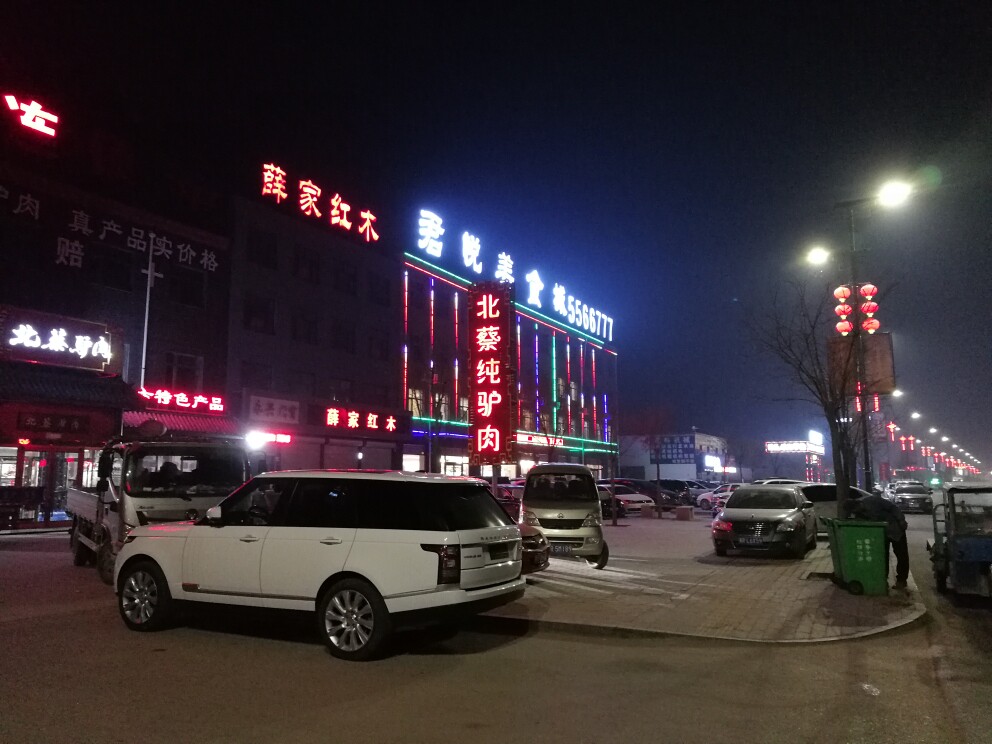 长城摩配商行的LOGO